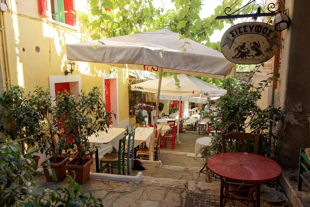 Taverna tables on Mnisikleous Street in Plaka, Athens